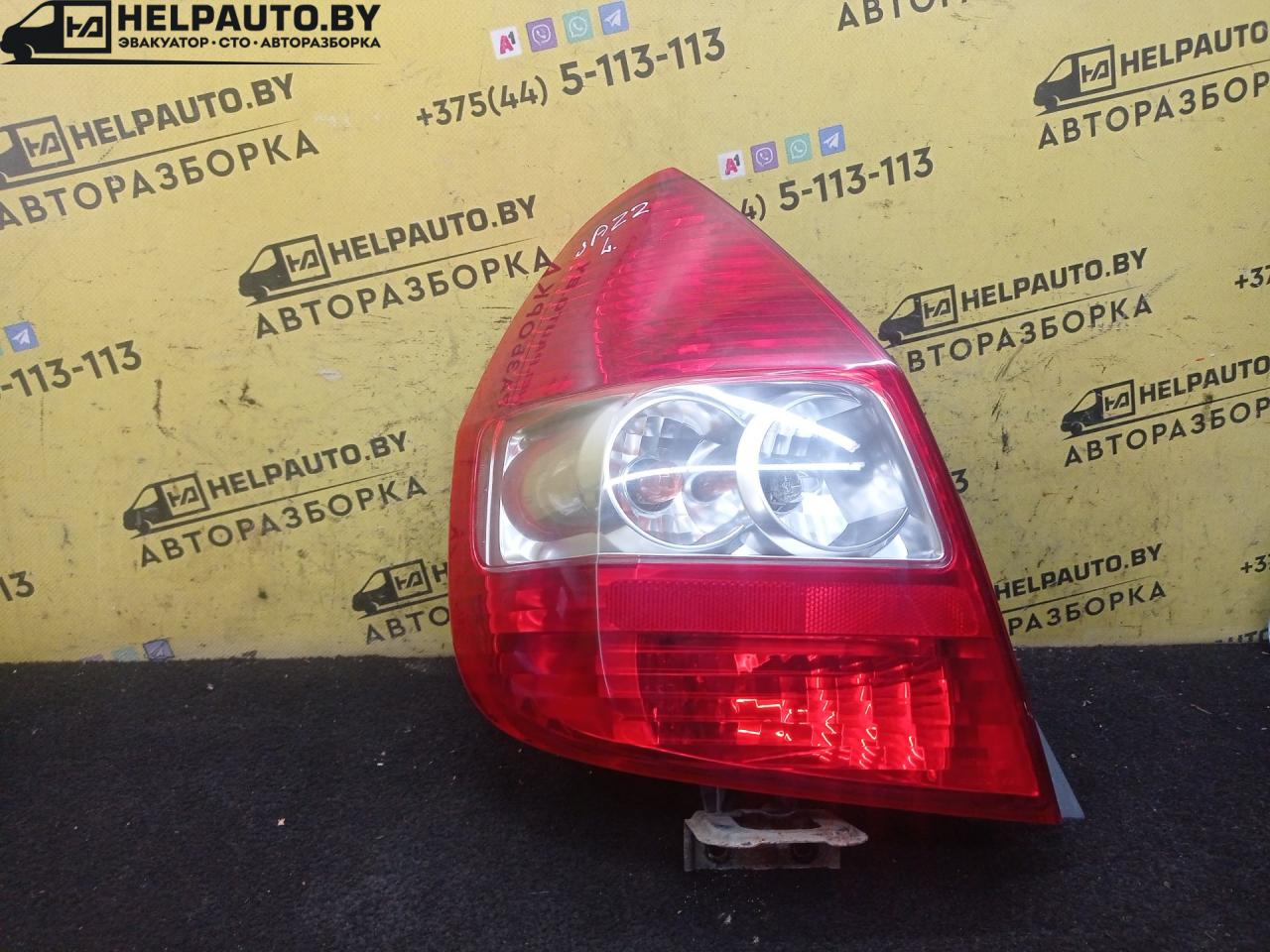 фонарь задний левый Honda Jazz 1 поколение 2002, 1.3 л., L13B, бензин, МКПП, голубой, хетчбэк 5 дв., передний привод - фото №1