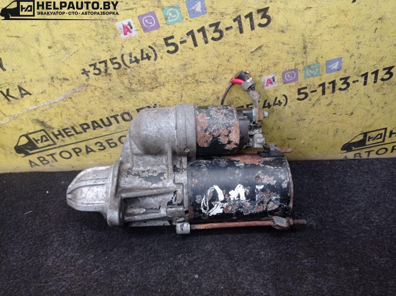 стартер Opel Astra F 1992, 1.4 л., C 14 NZ, бензин, МКПП, красный, хетчбэк 5 дв., передний привод - фото №1