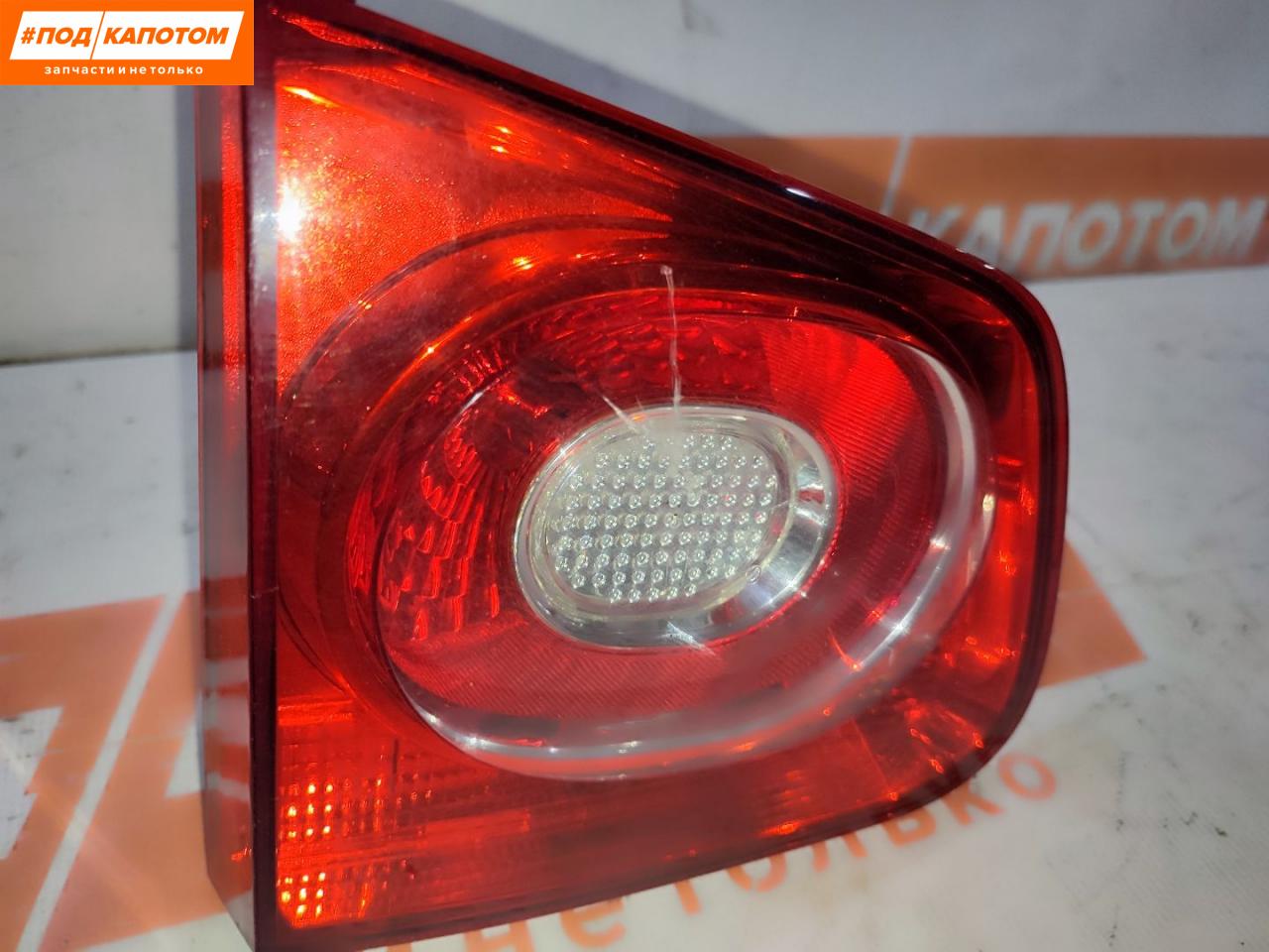 фонарь крышки багажника левый Volkswagen Tiguan 1 поколение 2010, 2.0 л., CAWA, бензин, АКПП, 7b / r7l, внедорожник 5 дв., полный привод, 5N0945093C - фото №1