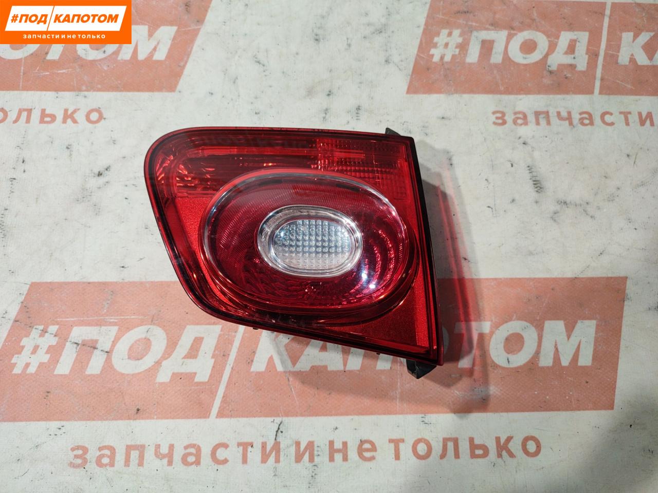 фонарь крышки багажника левый Volkswagen Tiguan 1 поколение 2008, 2.0 л., CBAB, дизель, АКПП, 2t / c9x, внедорожник 5 дв., полный привод, 5N0945093 - фото №1
