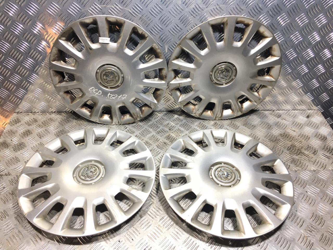 колпак колесный Opel Corsa D 2008, 1.0 л., Z 10 XEP, бензин, 5МКПП, чёрный, хетчбэк 3 дв., передний привод, правый руль, 13211852, 13211853 - фото №1