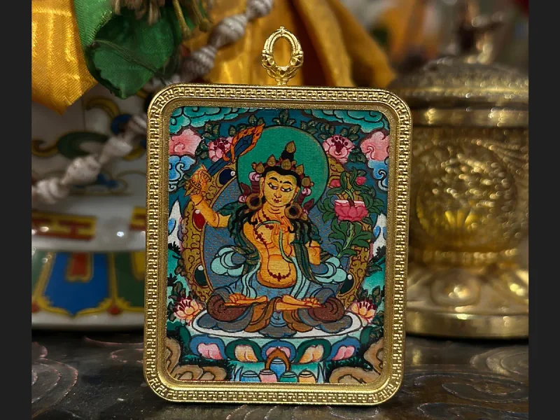Thangka pendant Manjushri, 4×5 cm.