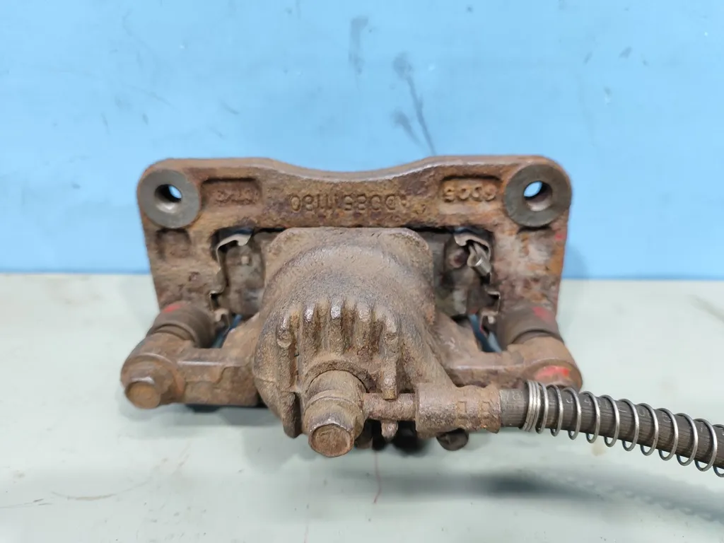 Суппорт задний левый Kia Sorento 1 BL 2006-2009 Рестайлинг