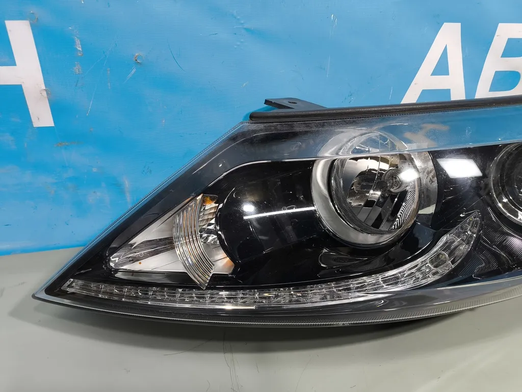 Фара левая Kia Sportage 3 2010-2014