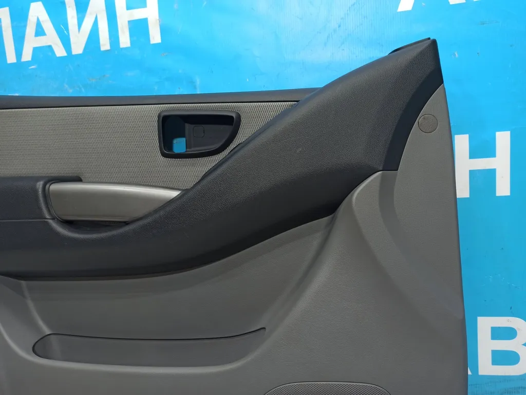 Обшивка двери передней левой Hyundai Grand Starex 2007-2015