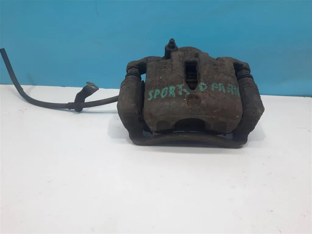 Суппорт передний правый Kia Sportage 3 2010-2014