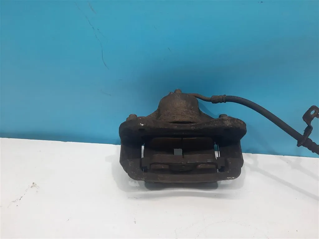 Суппорт передний правый Kia Sportage 3 2010-2014