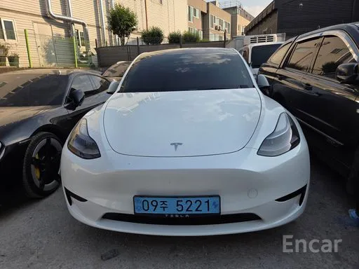 Tesla · Model Y · RWD · 2023 г. — фото