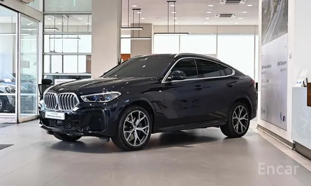 BMW · X6 (G06) · XDRIVE40I M Sports · 2023 г. — фото