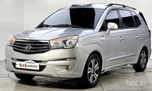 KG_Mobility_Ssangyong · Korando Turismo · 2WD GT 9 -seater · 2014 г. — фото