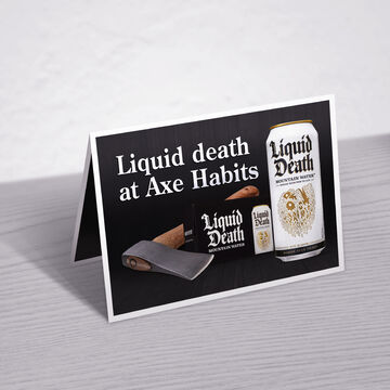 Рекламная табличка Liquid Death для AXE HABITS (Miami)