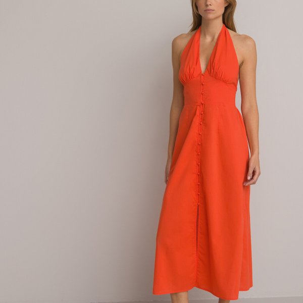 Купить Платье длинное с открытой спинкой 52 оранжевый
Погрузитесь в сердце 40-х годов б...
