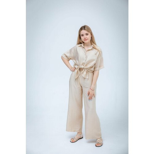 Купить Костюм, размер 44
Костюм женский брючный в пижамном стиле выполнен из дубайского...