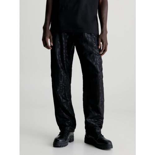 Купить Брюки Calvin Klein Jeans, размер XL, черный
брюки украшены принтом с логотипом в...