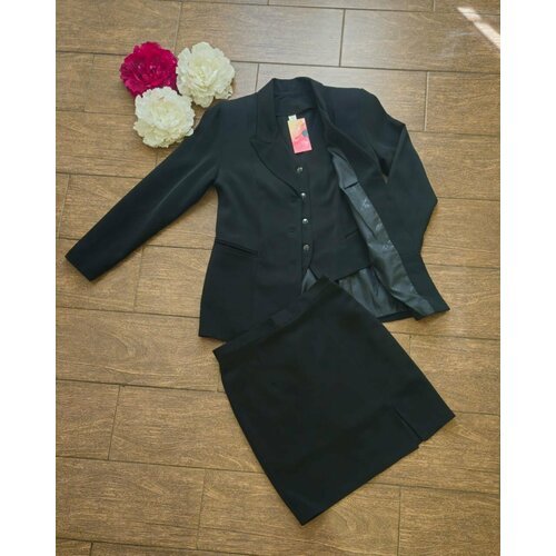 Купить Костюм , размер 48 , черный
Женский костюм тройка – стильный и практичный выбор...