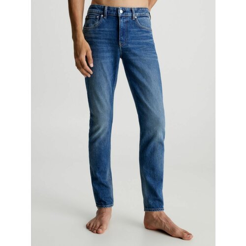 Купить Джинсы CALVIN KLEIN, размер 30/32, синий
Мужские джинсы Calvin Klein — это стиль...