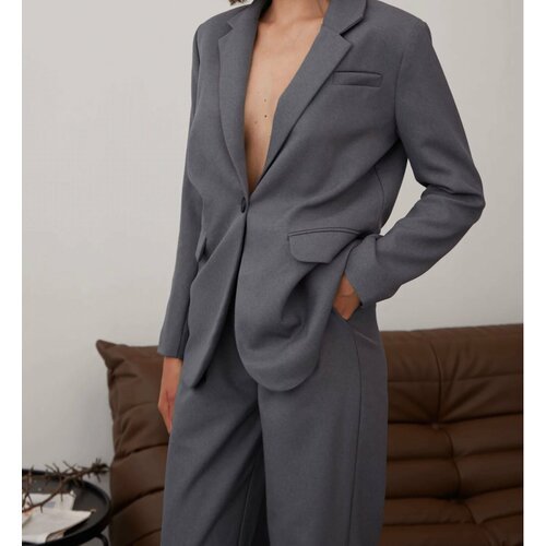 Купить Костюм, размер L, серый
Костюм с брюками палаццо от ODEЯNIЯ - стильный и комфорт...