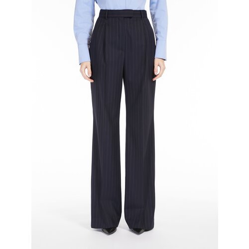 Купить Брюки Max Mara, размер 38, синий
Длинные брюки с завышенной талией из полушерстя...