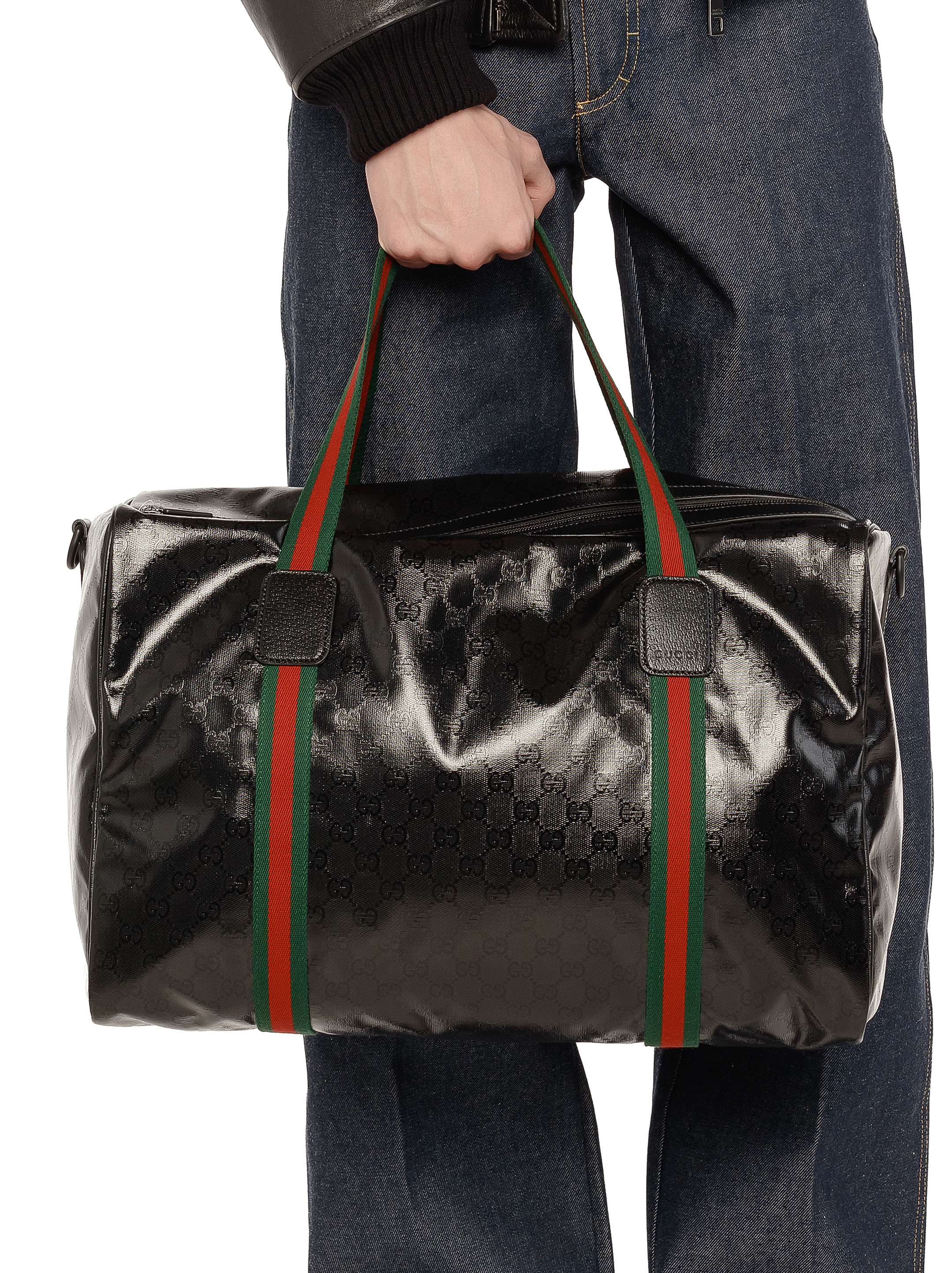 GG embossed leather duffle bag in black - Gucci | Mytheresa