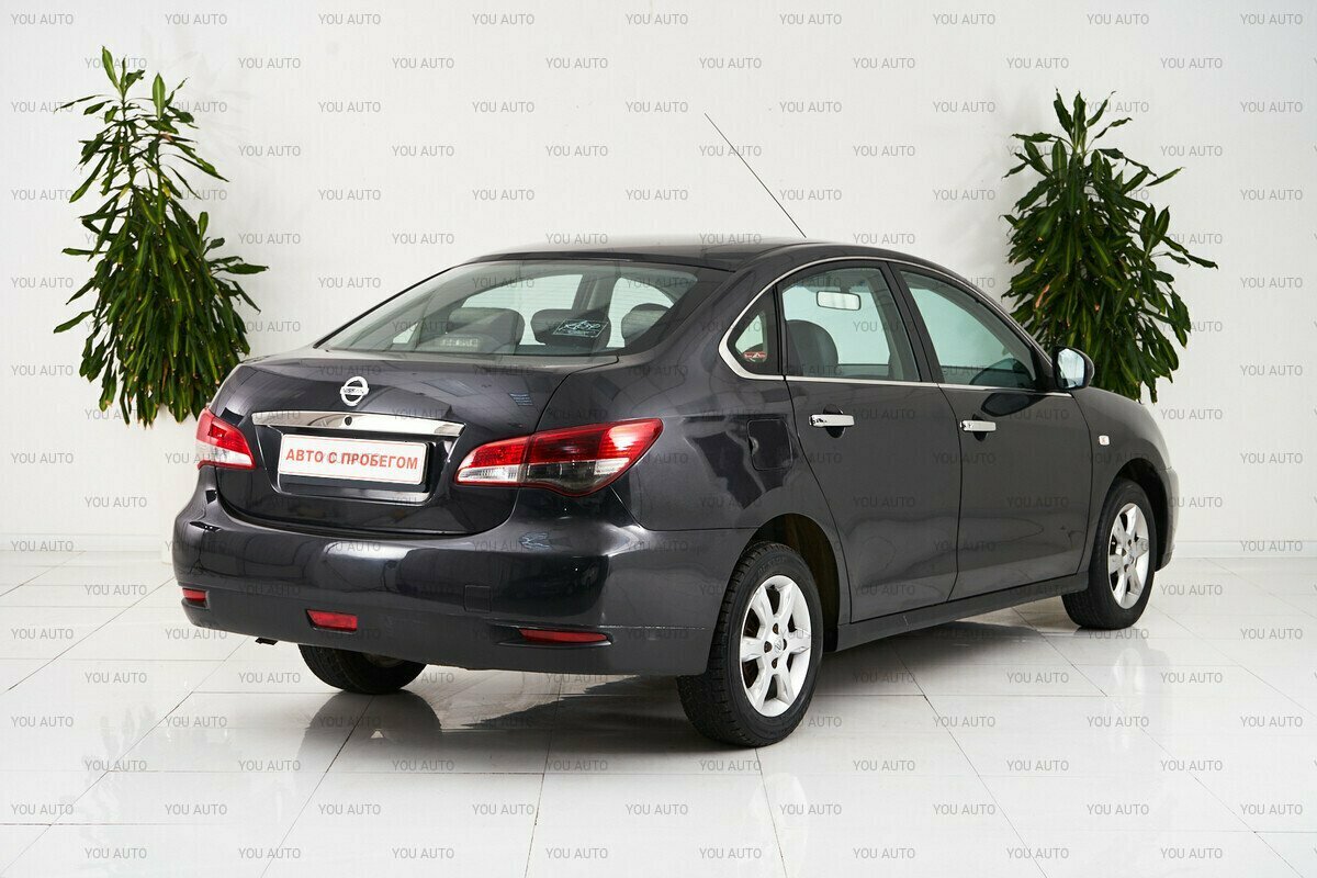 Nissan almera 15 кузов. Ниссан Альмера 2013г. Ниссан Альмера 3. Альмера 2013. Ниссан Альмера вид спереди.