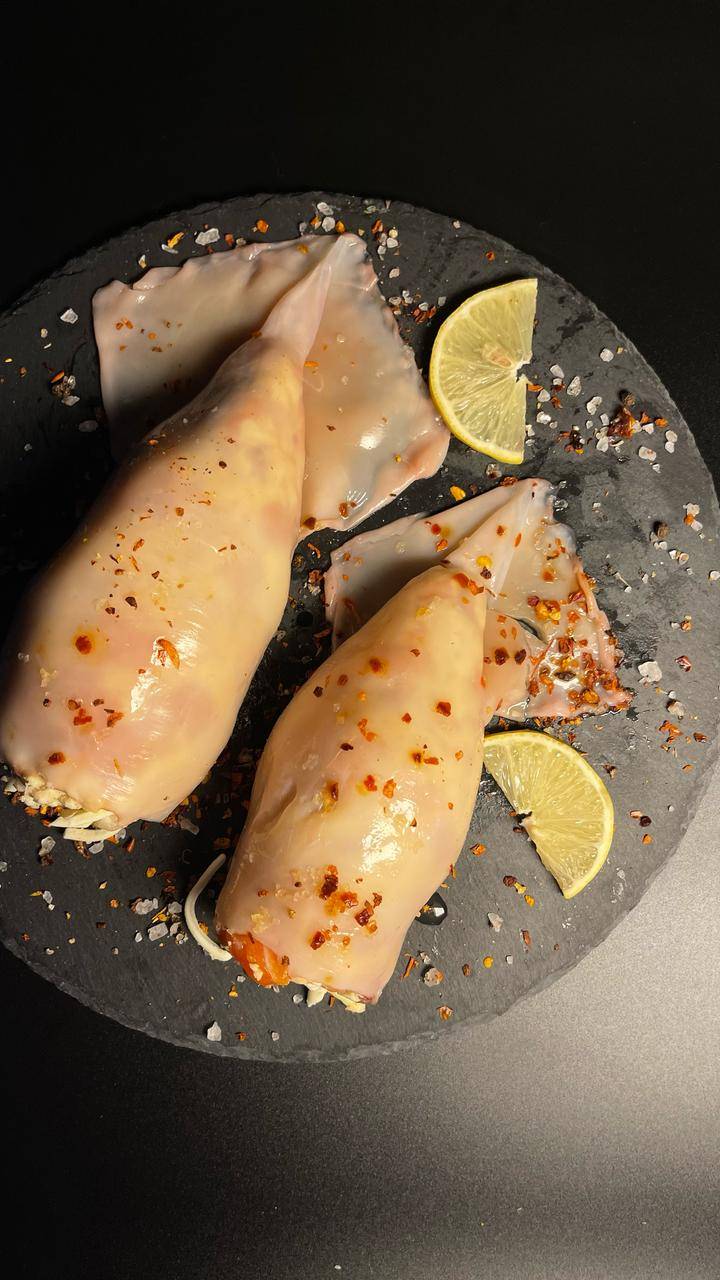 Кальмар фаршированный морепродуктами