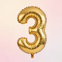 Balão de número dourado