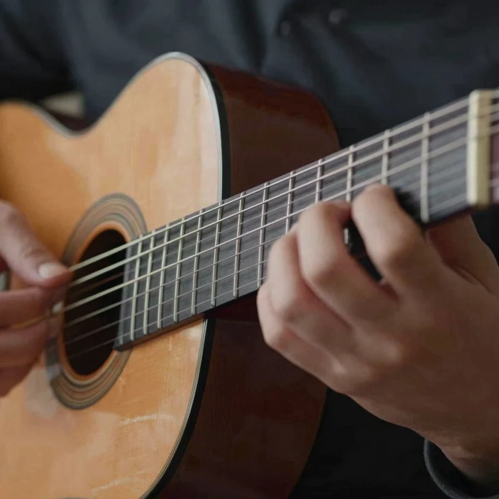 Detailed close-up of hands expertly playing a classical guit...