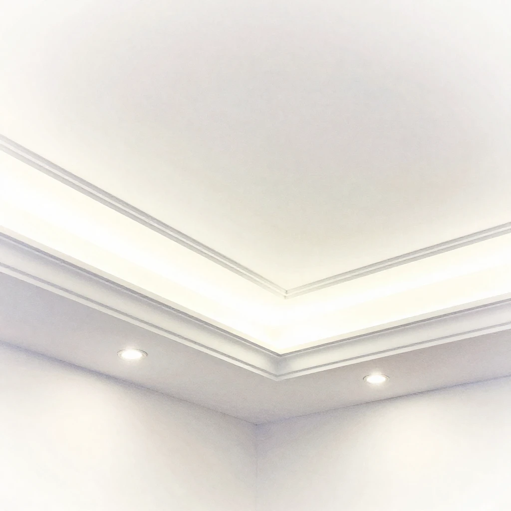 A close-up view of a smooth, elegant stretch ceiling with a ...
