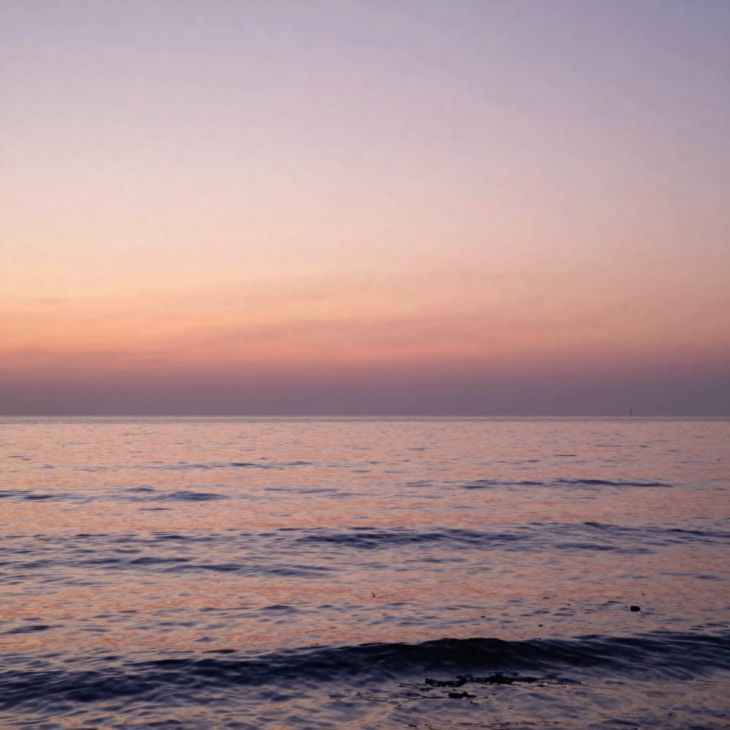 A serene, calm ocean at sunset, with soft, blending colors o...