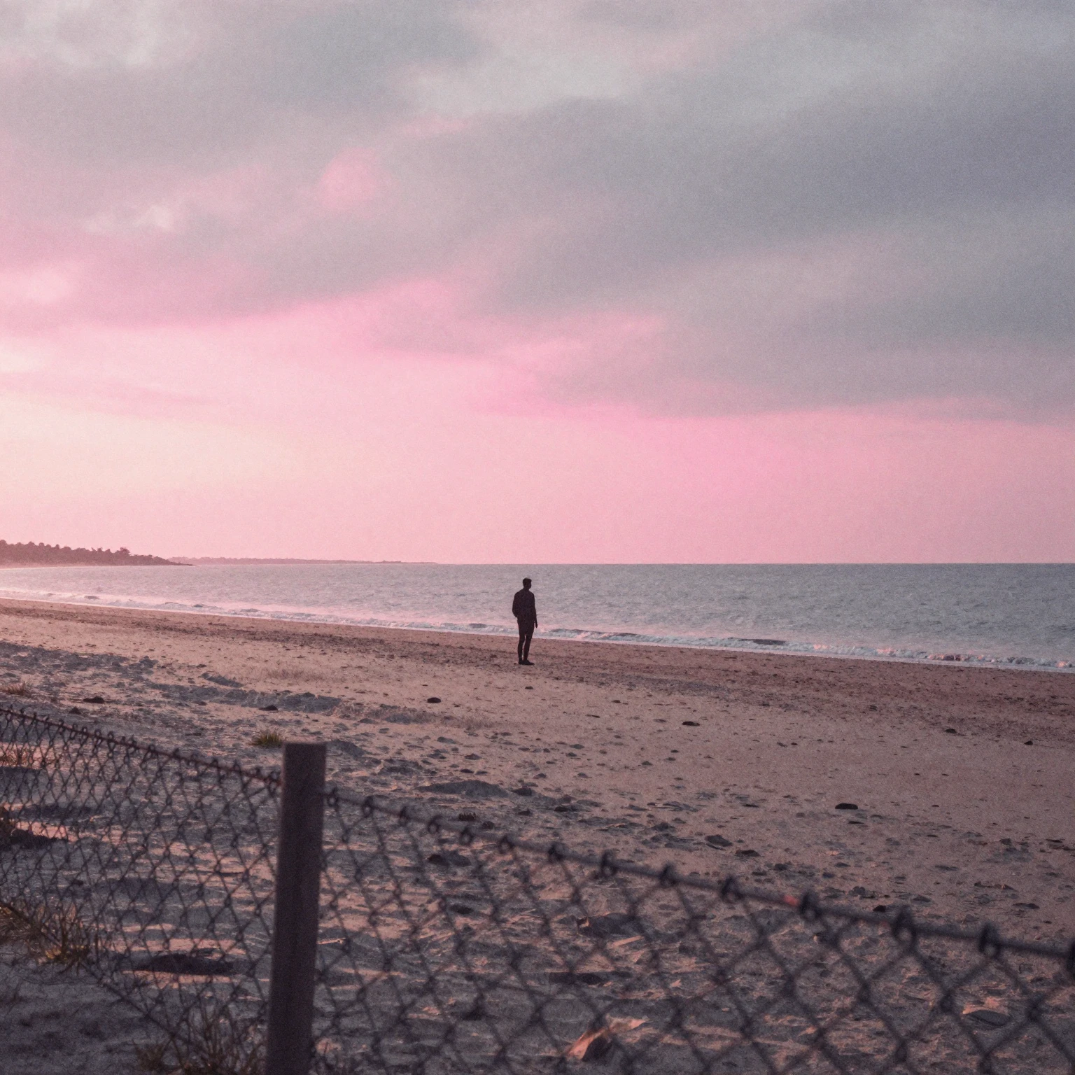 Vibrant watercolor style image of a serene seashore at dawn....