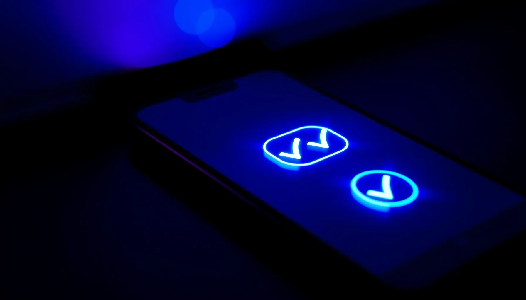 A glowing smartphone screen showing two blue checkmarks in a...