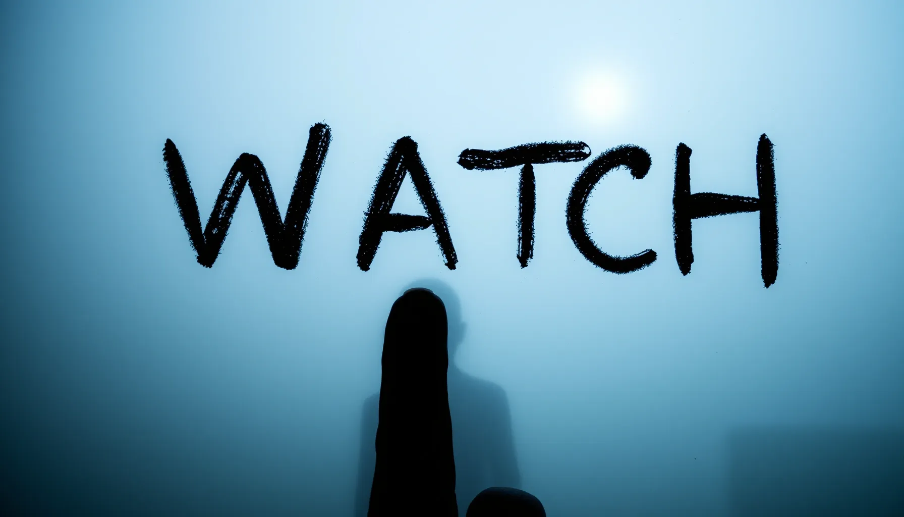 A close-up of a foggy window pane with the word 'WATCH' writ...