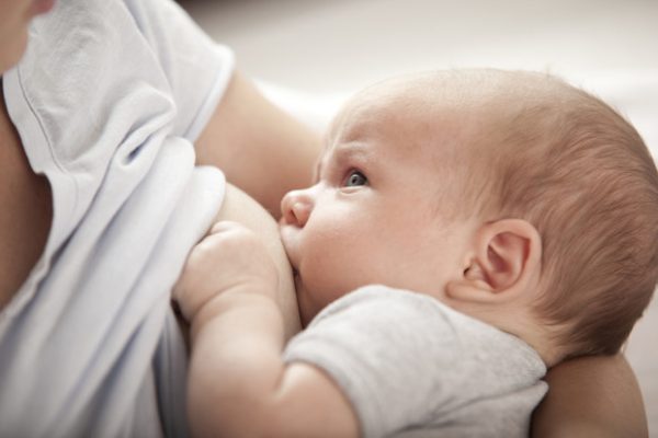 Baby sucking breast