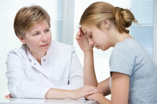 Doctor and teenager