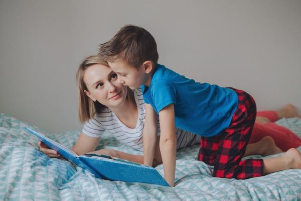 Mom reads to son