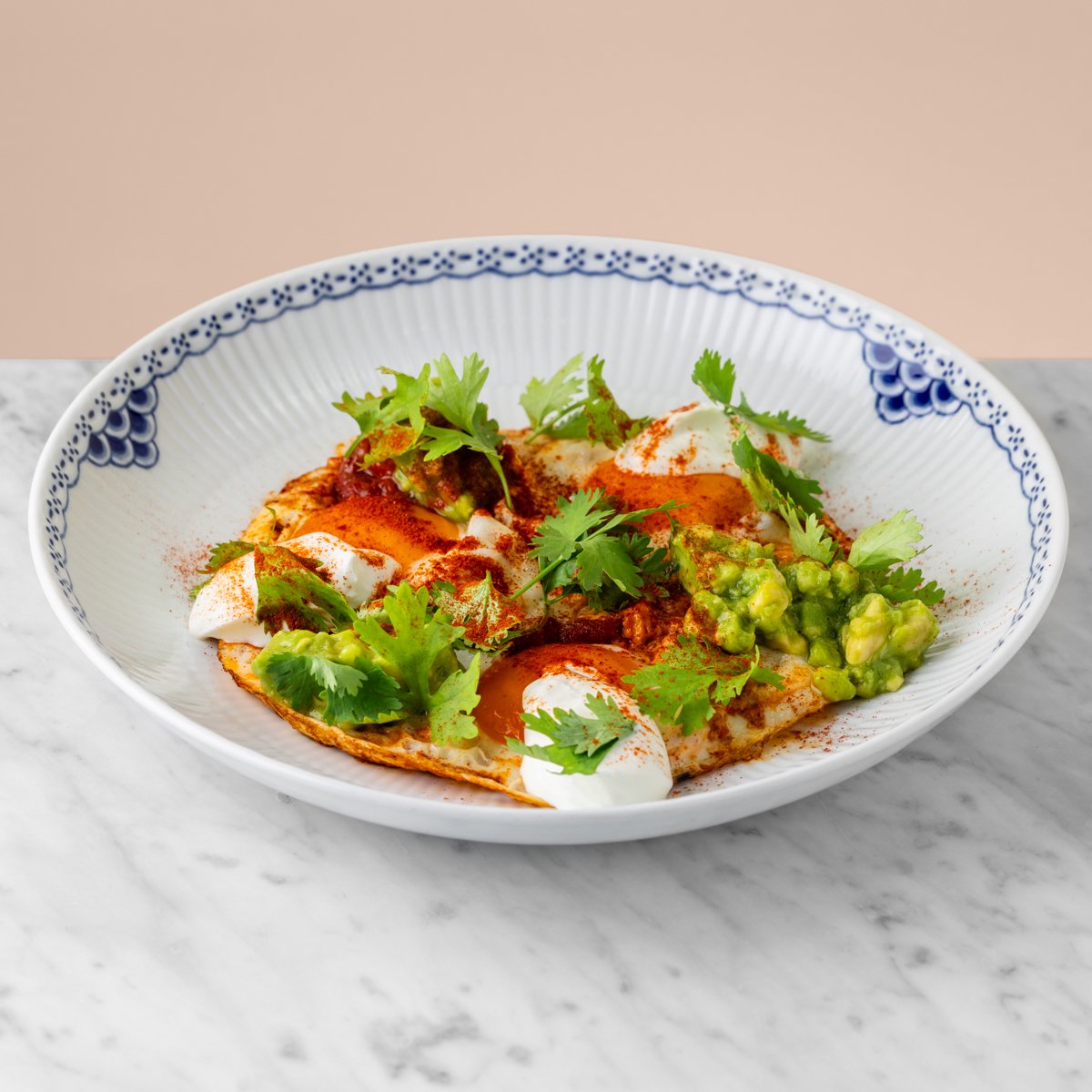 Shakshouka with avocado and yoghurt