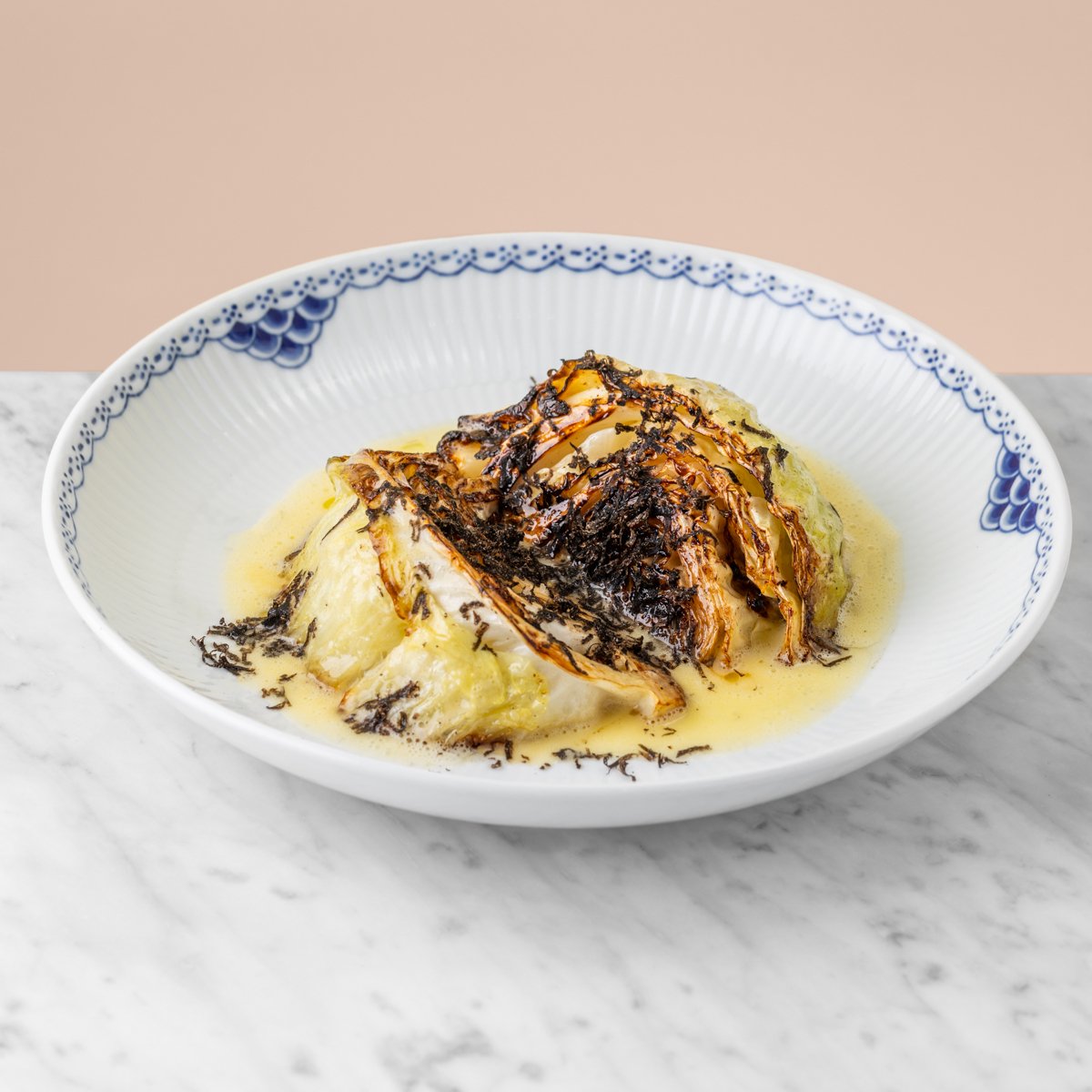 Young cabbage with black truffle