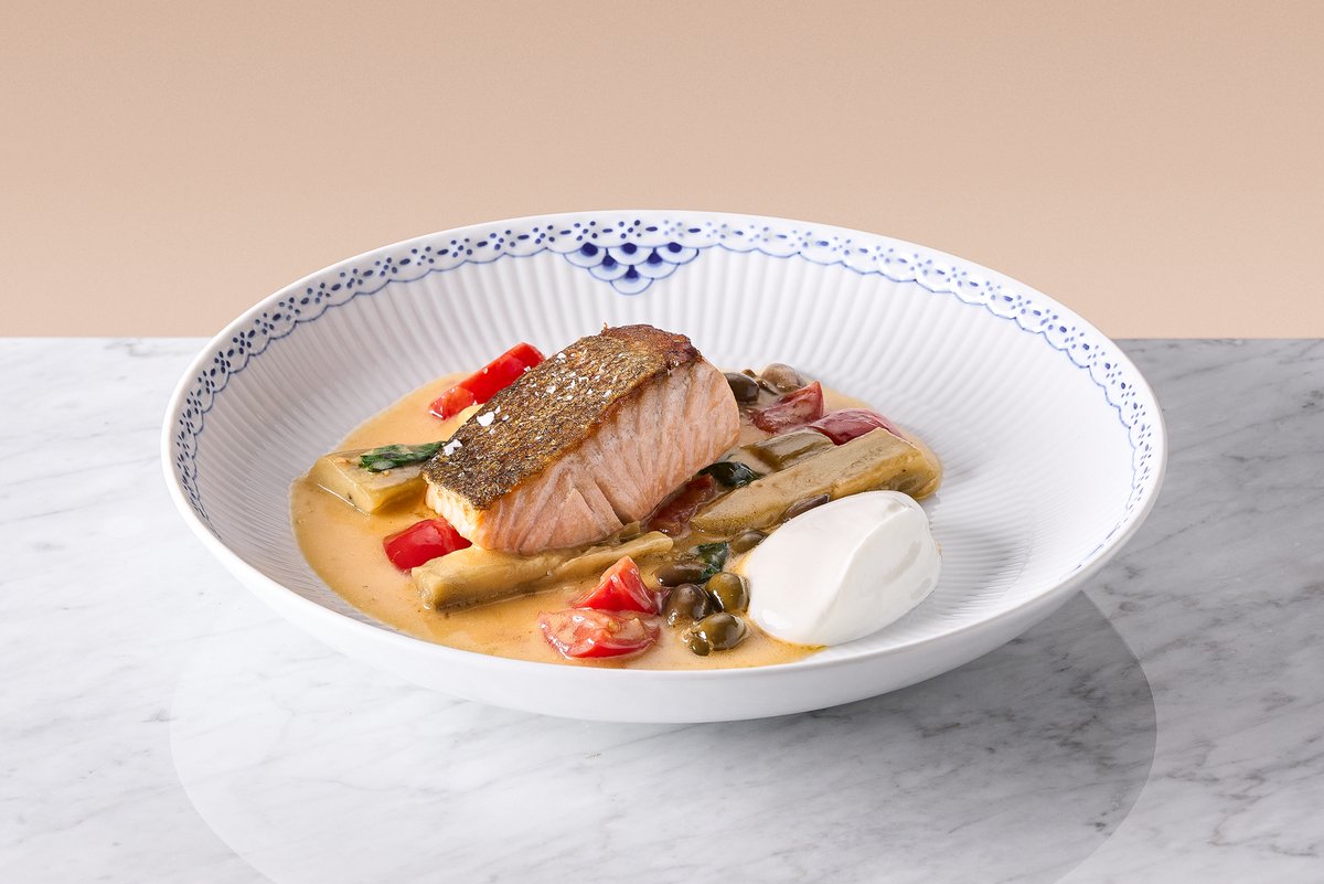 Salmon with tomato, eggplant and Taggiasche olives