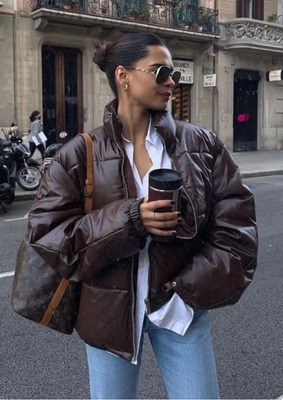 Emelie Natascha Lindmark в кожаном пуховике