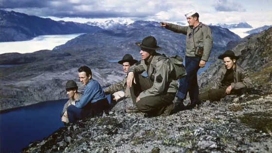 C-864_-_Members_of_a_mountain-climbing_trip_observe_the_glacier_after_climbing_to_this_great_height_in_Greenland._52289825160-v1