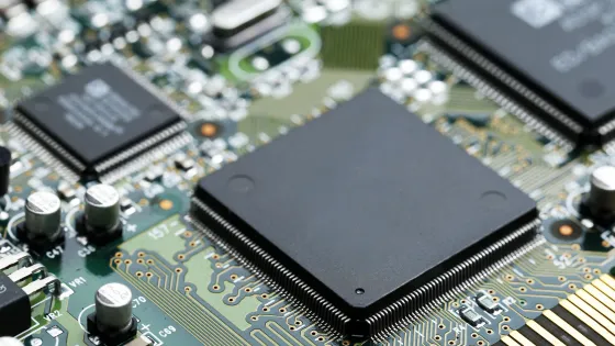 closeup-electronic-circuit-board-with-cpu-microchip-electronic-components-background