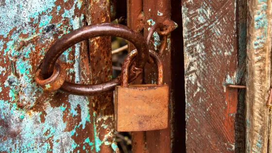 rusty-lock-old-hand-made-door_1268-17427