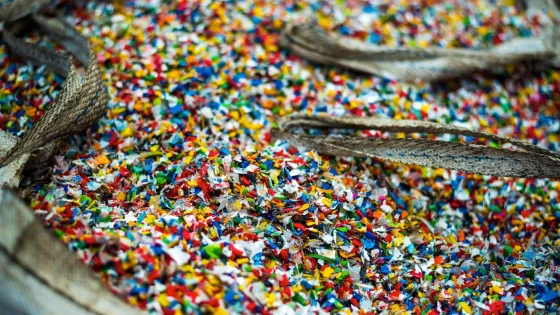 sack-sorted-multicoloured-shredded-plastic-garbage-waste-recycling-factory_1268-23442