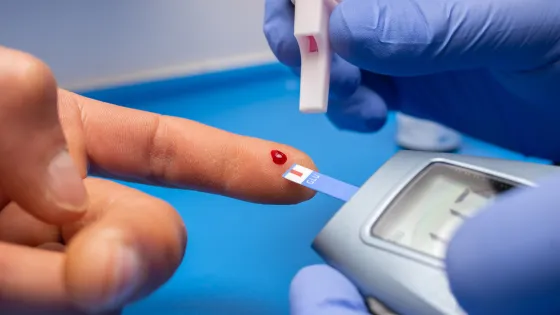 closeup-shot-doctor-with-rubber-gloves-taking-blood-test-from-patient