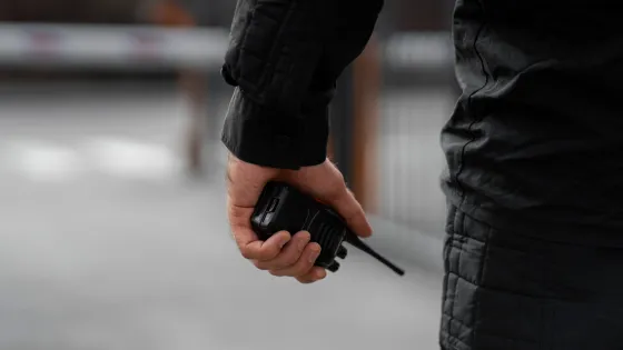 portrait-male-security-guard-with-radio-station