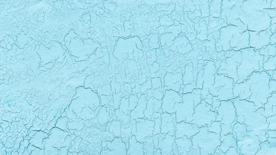 light-blue-lime-plaster-with-cracks-background-scaled