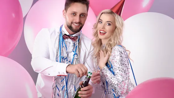 young-couple-celebrating-new-years-eve 1