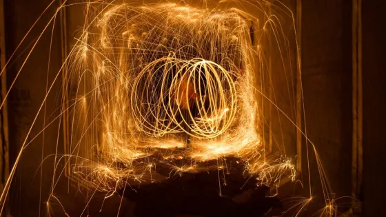 amazing-steel-wool-fire-circles-night-with-glowing-sparks_181624-44746