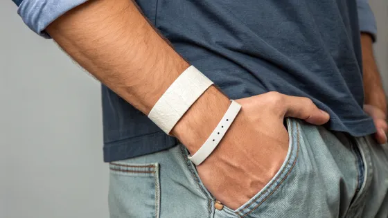 man-in-paper-bracelet