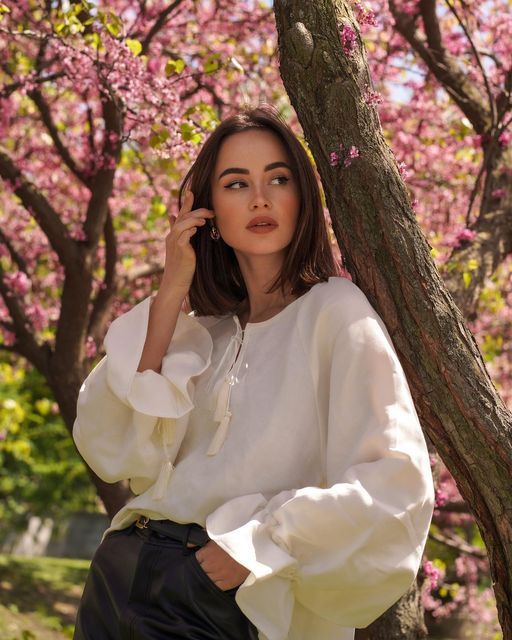 Soft girl photoshooting | Cherry blossom photoshoot outfit, Senior picture ideas cottage core, Romantic minimal ruffled blouse